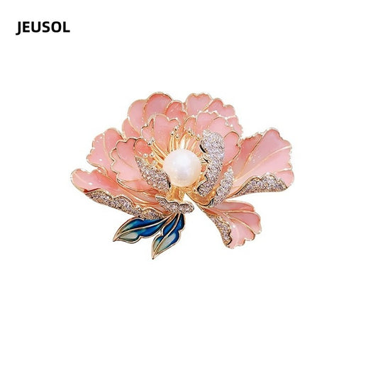 JEUSOL Floral Brooch with Pink Enamel Petals, Faux Pearl Center, and Sparkling Crystal Accents – Stunning Gold-Plated Pin for Women, Perfect for Dresses, Scarves, and Special Occasion